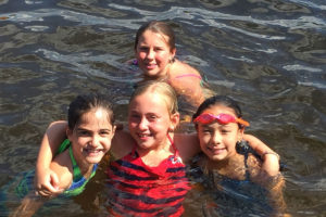 children in lake - camp hadar - jewish day camp New Hampshire